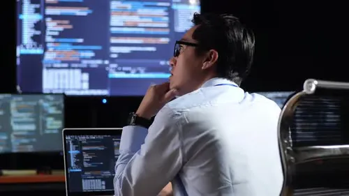 The programmer of the AI era working with an AI coding assistant